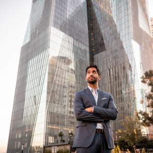 business man outside building 