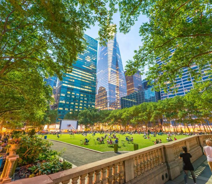 A Park With A Large Building In The Background