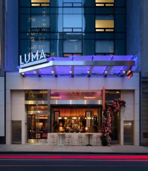 Exterior of LUMA Hotel Times Square at night