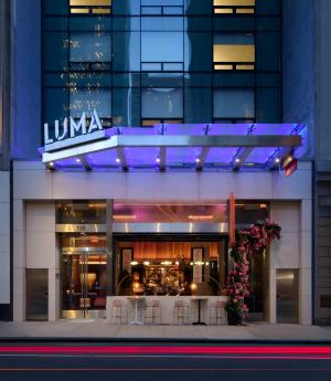 Exterior of LUMA Hotel Times Square at night