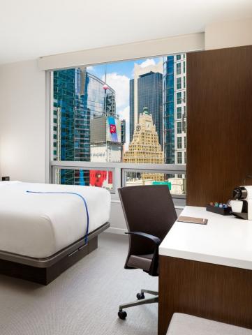 bedroom with a view of NYC skyline