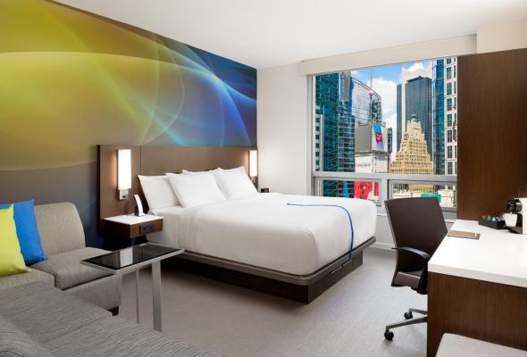 bedroom with a view of NYC skyline