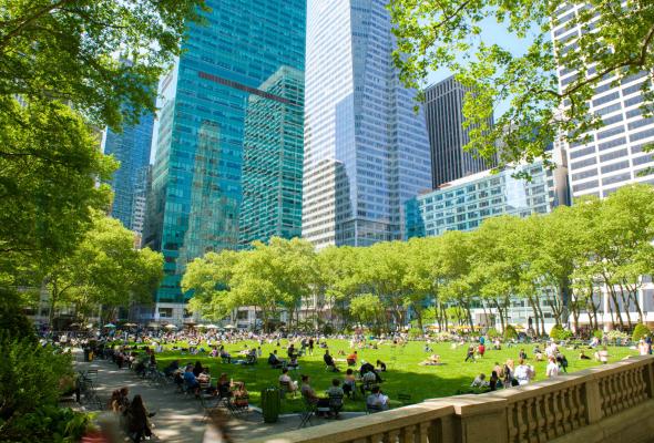 People lounging on the lawn at Bryant Park NYC