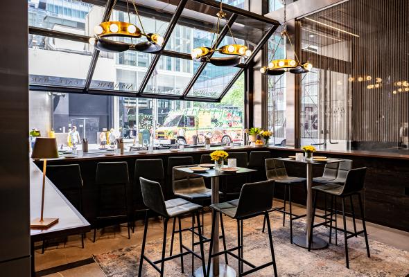 Front lounge with open window at AperiBar NYC