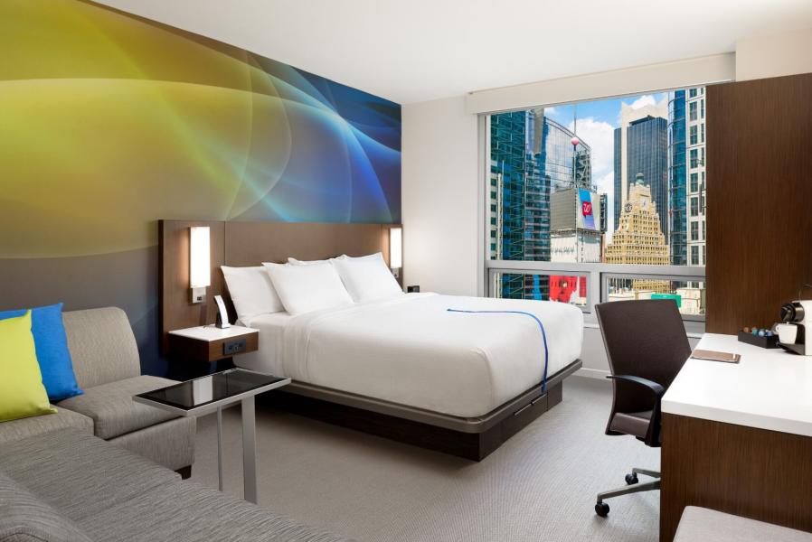 bedroom with a view of NYC skyline
