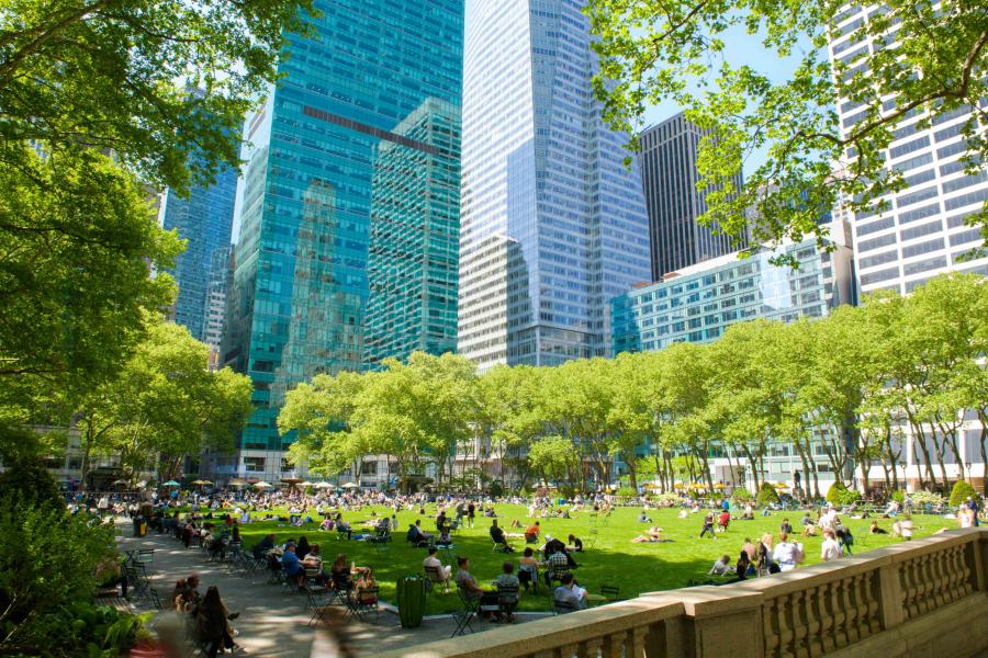 People lounging on the lawn at Bryant Park NYC