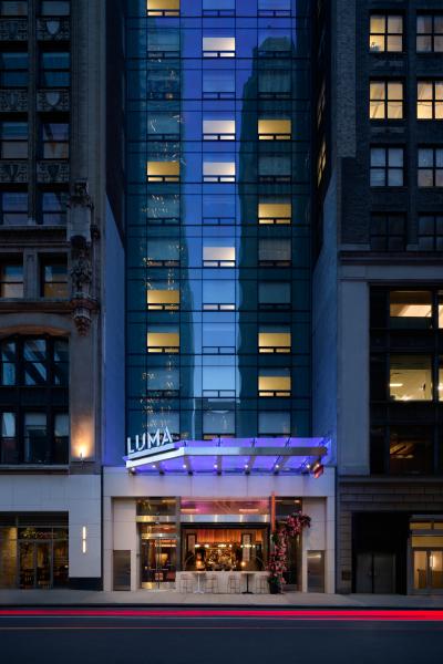 Exterior of LUMA Hotel Times Square at night