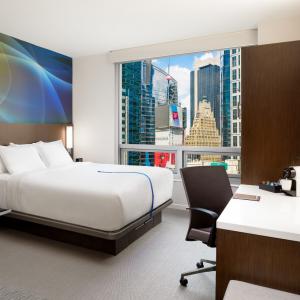 bedroom with a view of NYC skyline