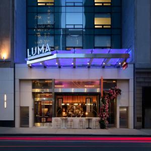 Exterior of LUMA Hotel Times Square at night