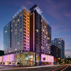 Exterior of LUMA Hotel San Francisco at dusk